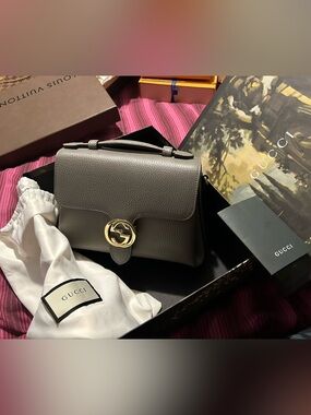 Gucci Interlocking handbag in calfskin leather with gold hardware